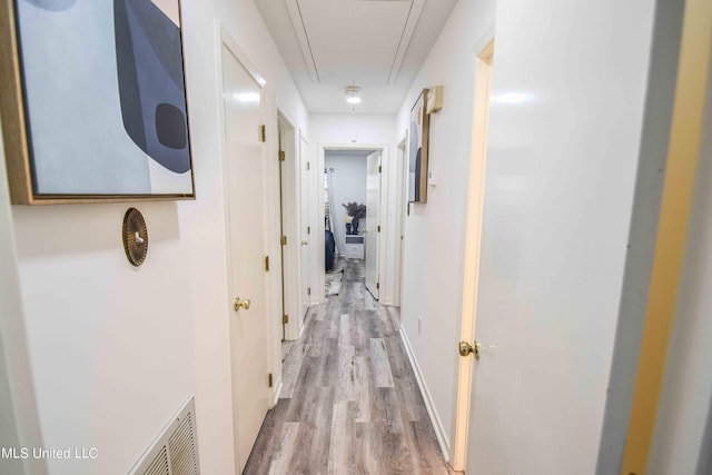 hall featuring light hardwood / wood-style floors