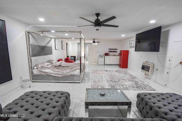 bedroom featuring ceiling fan, an AC wall unit, and heating unit