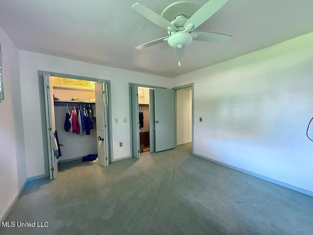 unfurnished bedroom featuring carpet flooring, baseboards, and ceiling fan