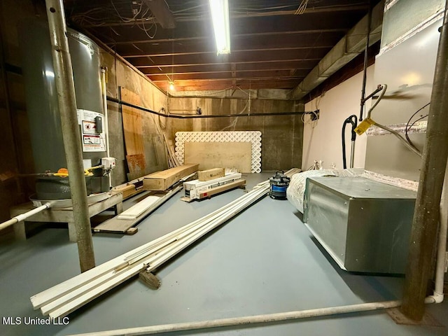 unfinished basement with gas water heater