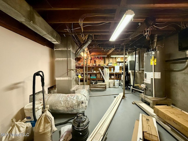 unfinished basement featuring heating unit and water heater