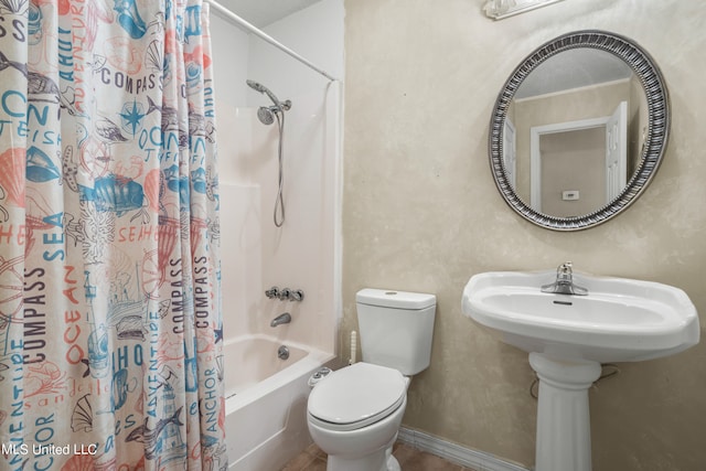 bathroom with shower / bathtub combination with curtain and toilet