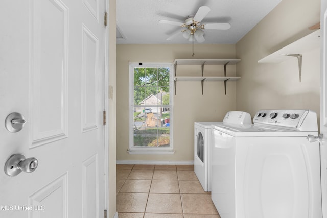 washroom with ceiling fan, washer and dryer, and light tile patterned floors