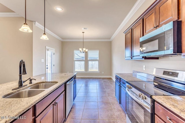 kitchen featuring sink, pendant lighting, crown molding, and stainless steel appliances