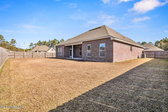 back of house featuring central AC unit and a patio