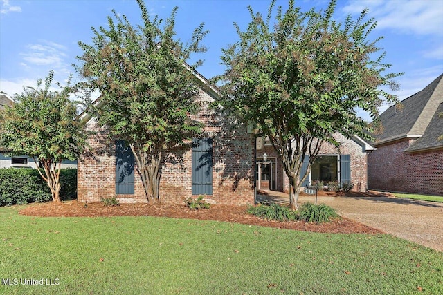 111 Southampton Cir, Madison, MS 39110 - view of property hidden behind natural elements with a front lawn and brick siding