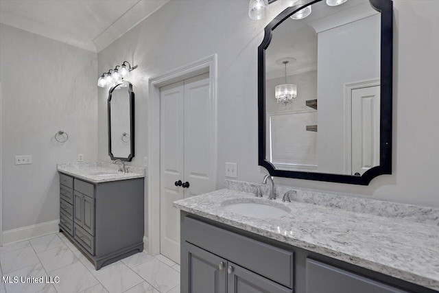 bathroom with vanity and ornamental molding