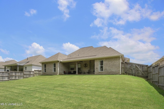 168 Shore View Dr, Madison, MS 39110 - rear view of property with a fenced backyard, brick siding, and a patio