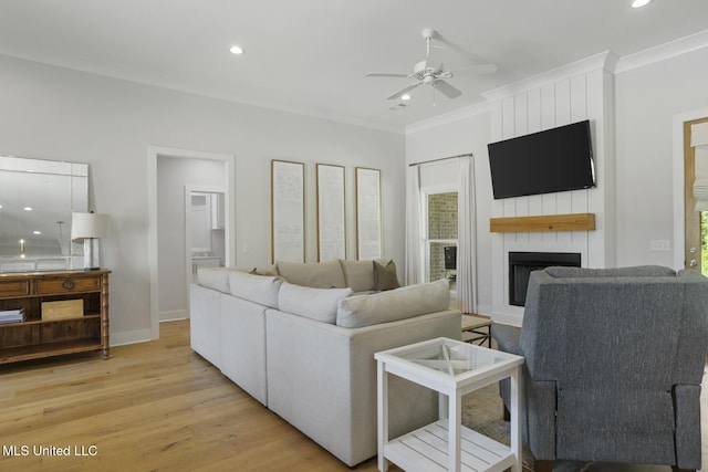 168 Shore View Dr, Madison, MS 39110 - living area with a ceiling fan, crown molding, light wood-style floors, a fireplace, and recessed lighting