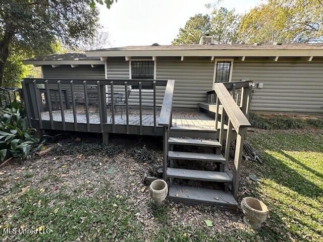 rear view of house with a deck