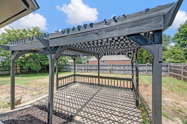 10326 Amanda Dr, Olive Branch, MS 38654 - fenced backyard featuring a pergola and a patio area