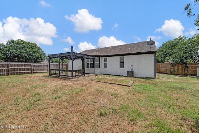 10326 Amanda Dr, Olive Branch, MS 38654 - back of house featuring a pergola, a fenced backyard, and brick siding