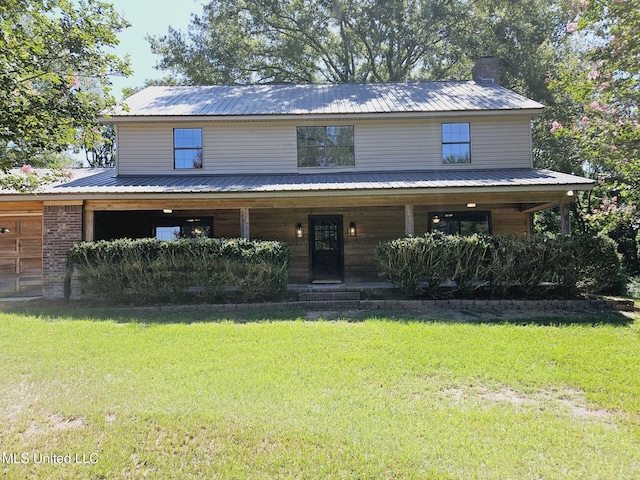 farmhouse with a front yard