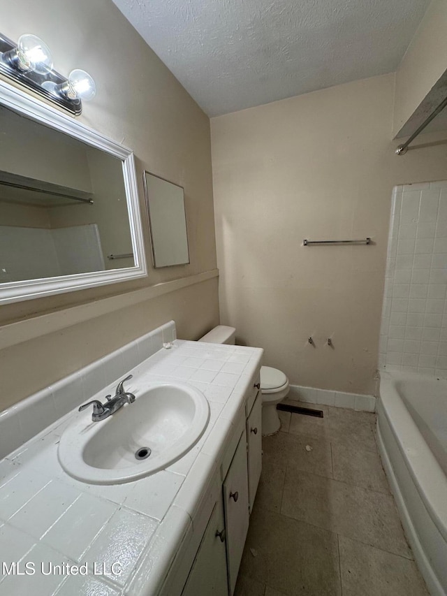 3115 Shirley Dr, Jackson, MS 39212 - full bathroom with vanity, a textured ceiling, and tile patterned floors