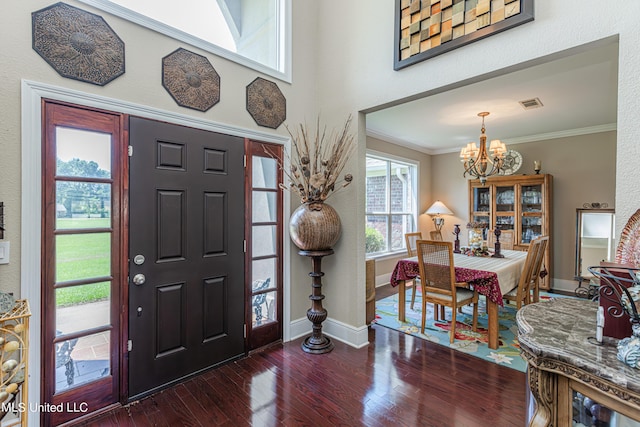 1000 Cedar Hill Rd, Madison, MS 39110 - foyer featuring a chandelier, wood finished floors, crown molding, and baseboards