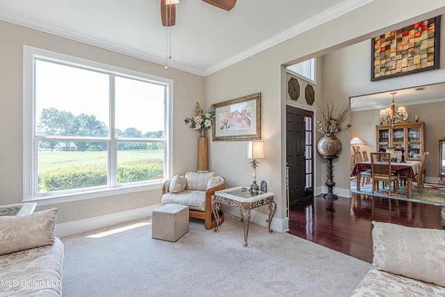 1000 Cedar Hill Rd, Madison, MS 39110 - living area with a chandelier, baseboards, carpet flooring, crown molding, and a ceiling fan