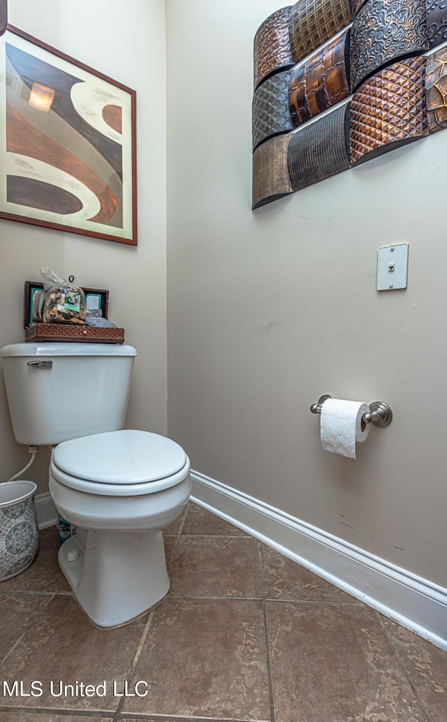1000 Cedar Hill Rd, Madison, MS 39110 - bathroom featuring baseboards, toilet, and tile patterned flooring