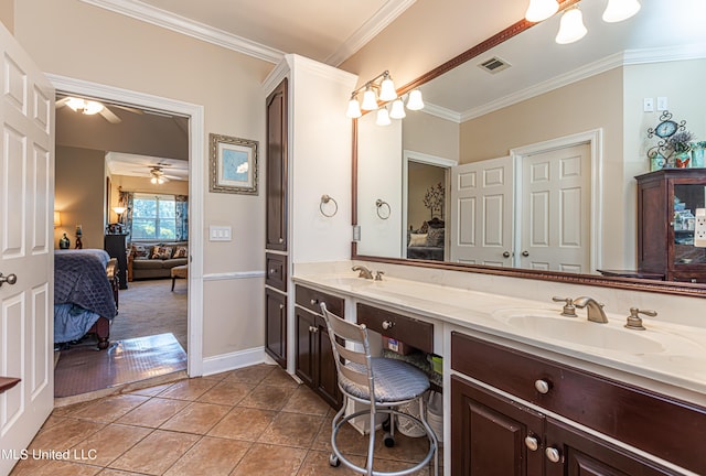 1000 Cedar Hill Rd, Madison, MS 39110 - ensuite bathroom with crown molding, double vanity, a ceiling fan, tile patterned flooring, and baseboards