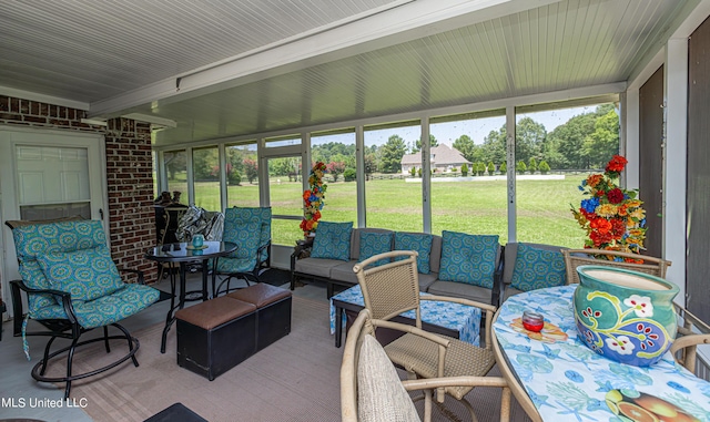1000 Cedar Hill Rd, Madison, MS 39110 - sunroom / solarium with outdoor lounge area, healthy amount of natural light, outdoor dining area, and beamed ceiling