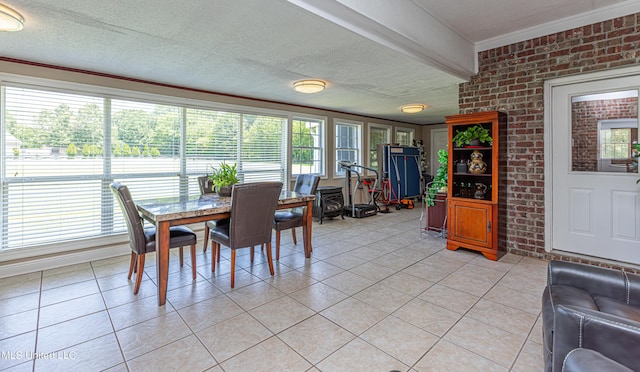 1000 Cedar Hill Rd, Madison, MS 39110 - dining space with brick wall, light tile patterned flooring, and healthy amount of natural light