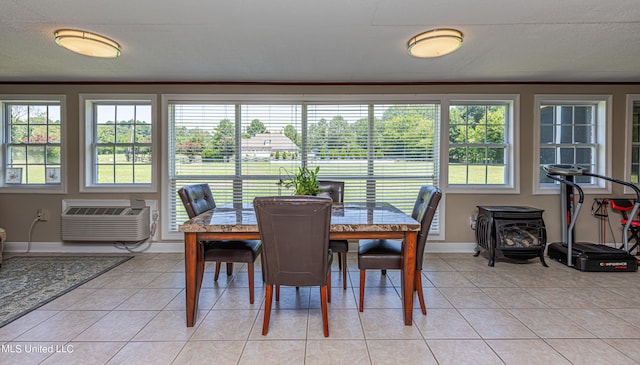1000 Cedar Hill Rd, Madison, MS 39110 - dining room featuring plenty of natural light, a wall unit AC, baseboards, and light tile patterned floors