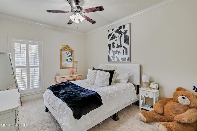 bedroom with ceiling fan, crown molding, and light carpet