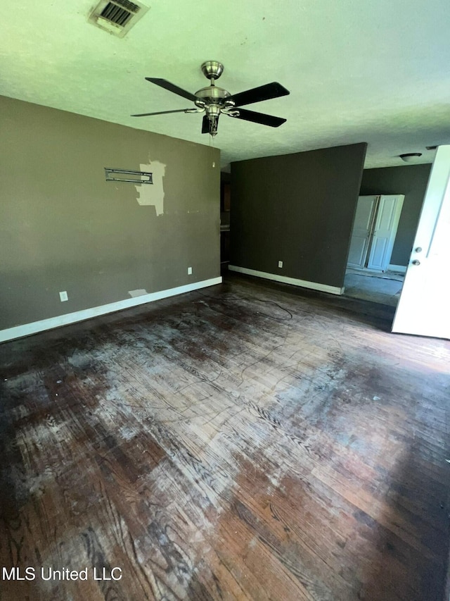 4515 25th St, Meridian, MS 39307 - spare room with wood-type flooring, a ceiling fan, and baseboards