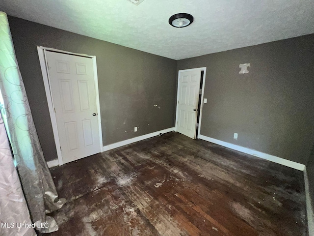 4515 25th St, Meridian, MS 39307 - spare room with wood finished floors and baseboards
