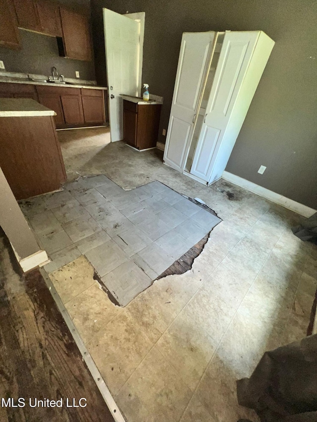 4515 25th St, Meridian, MS 39307 - kitchen with baseboards and a sink
