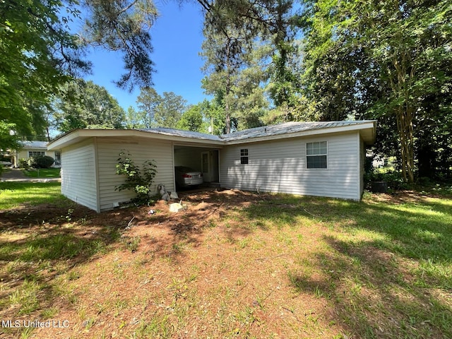 4515 25th St, Meridian, MS 39307 - rear view of property with a lawn