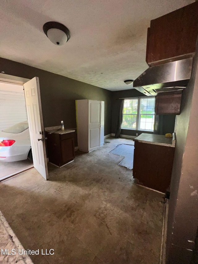 4515 25th St, Meridian, MS 39307 - kitchen featuring a textured ceiling