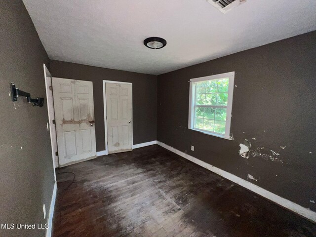 4515 25th St, Meridian, MS 39307 - unfurnished bedroom featuring wood finished floors and baseboards