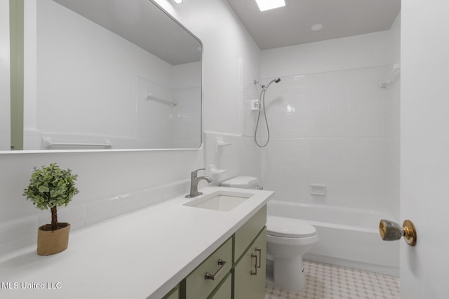full bathroom featuring tile patterned floors, toilet, vanity, and shower / tub combination