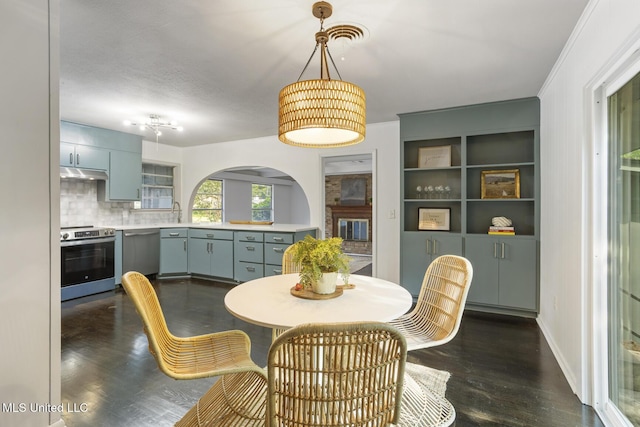 dining room featuring dark wood finished floors