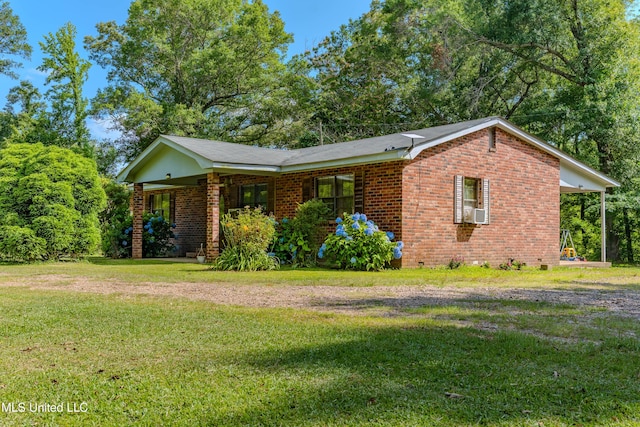 5699 Hebron Church Rd, Bentonia, MS 39040 - view of front of property featuring brick siding, a front yard, and cooling unit