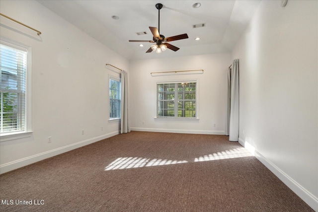 empty room featuring carpet flooring and ceiling fan