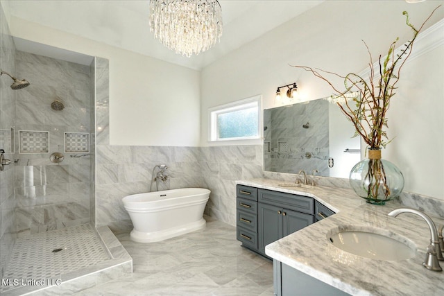 bathroom featuring vanity, independent shower and bath, and tile walls