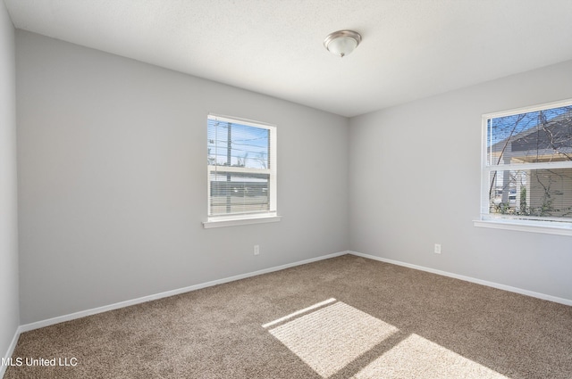 view of carpeted spare room