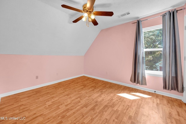 8968 Tahoe Cv, Olive Branch, MS 38654 - bonus room featuring light wood finished floors, a ceiling fan, and lofted ceiling
