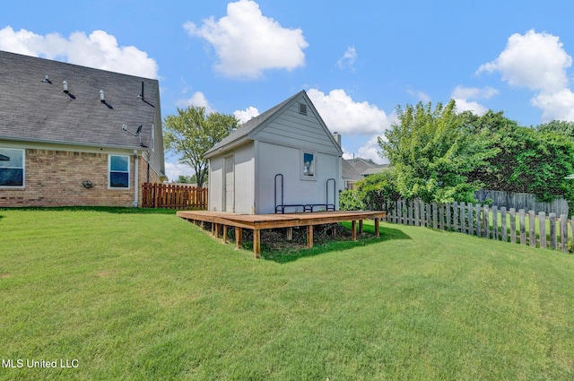 8968 Tahoe Cv, Olive Branch, MS 38654 - back of house featuring a fenced backyard, a wooden deck, and brick siding