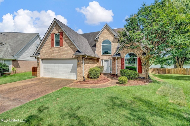 8968 Tahoe Cv, Olive Branch, MS 38654 - traditional-style home with brick siding, concrete driveway, and an attached garage