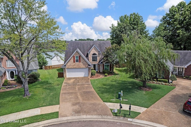 8968 Tahoe Cv, Olive Branch, MS 38654 - traditional-style house featuring driveway, a front lawn, and stone siding