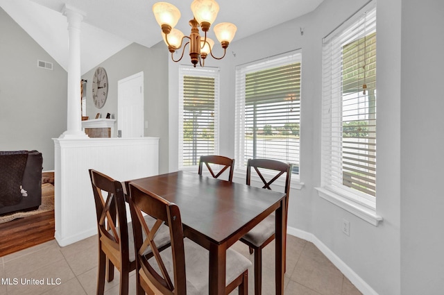 8968 Tahoe Cv, Olive Branch, MS 38654 - dining area with light tile patterned floors, plenty of natural light, and decorative columns
