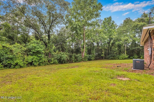 29 Summer Ln, Poplarville, MS 39470 - view of grassy yard featuring central AC unit