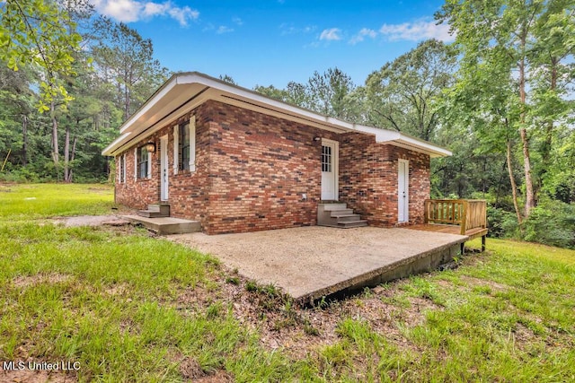29 Summer Ln, Poplarville, MS 39470 - back of property featuring brick siding, entry steps, and a patio area