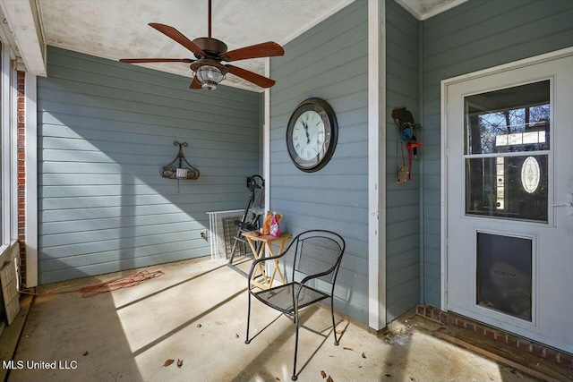 view of patio with ceiling fan