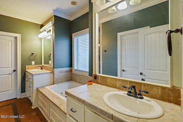 bathroom featuring vanity, ornamental molding, and a bath