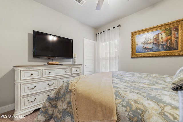 bedroom with baseboards, carpet, and ceiling fan