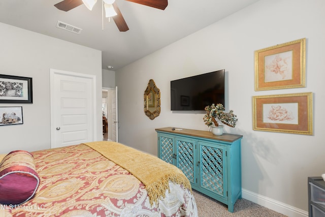 bedroom featuring baseboards, carpet floors, and ceiling fan