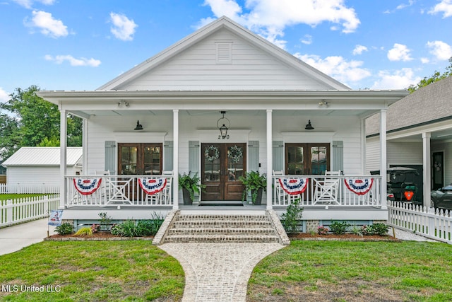 view of front of house featuring a front lawn and a porch